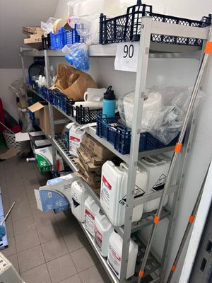 a room with a lot of boxes and boxes on the shelves