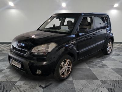 a picture of a black suv parked in a garage