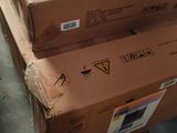 two boxes stacked on top of each other in a warehouse