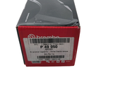 a red box with a black and white label and a barcode on it