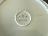 a white plate with a blue and white label on it
