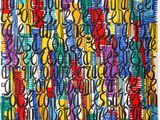 a multicolored piece of art with a lot of letters on it
