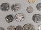 a lot of coins that are sitting on a table