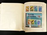 an open book with a picture of birds on it