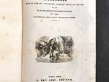 an open book with a picture of a man and a dog on it