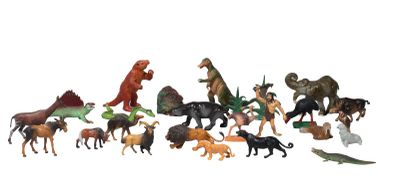 a lot of toy animals that are on a white surface