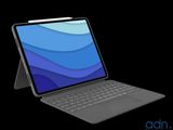 a close up of a laptop with a keyboard on a black background