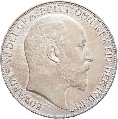 a close up of a coin with a man ' s face on it