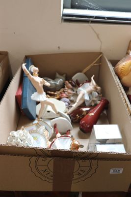 a box full of assorted items sitting on the floor