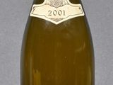 a bottle of wine that is sitting on a table