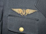 a close up of a military uniform with a badge on it