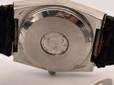 an image of a close up of a watch on a white surface