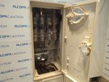 an image of a refrigerator that is in a room