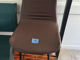 two chairs that are next to each other on the floor