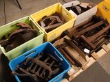 many boxes of different types of tools sitting on a pallet