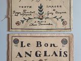 two old french linen labels on a blue wall