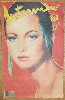 a magazine with a picture of a woman on the cover