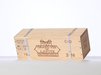 a wooden box with a sign on it that says grand vin lafitte
