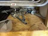 a lot of tools that are sitting on a shelf