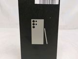 a black box with a white sticker on it that says galaxy s4 lite