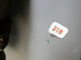 a sticker on the back of a motorcycle with the number twenty on it