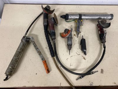 a lot of tools that are sitting on a table