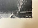 a black and white drawing of a cat sitting under a bridge