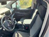 a picture of the interior of a car with the driver ' s seat up