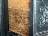 a close up view of a drawer with a flower design on it