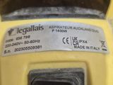 the back of a yellow machine with a label on it ' s side