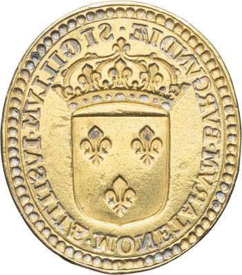 une pièce d'or surmontée d'une couronne