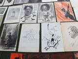 many drawings on the wall of a room