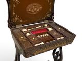 a small wooden table with a game on it