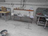 a room that has a lot of work in it