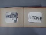an open book with pictures of people and buildings on it