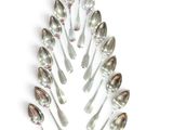 a lot of spoons that are arranged in a shape of a tree