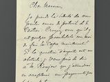 a handwritten letter written in black ink on a piece of paper