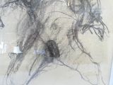 a drawing of a woman sitting on a couch