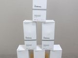 five boxes stacked on top of each other on a wooden stand