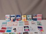 a white table with many cards on it