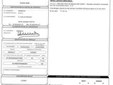 a black and white image of a document with a barcode on it