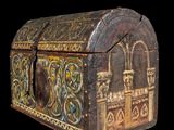 an old wooden chest with a decorative design on it