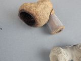 two small objects that are sitting on a table