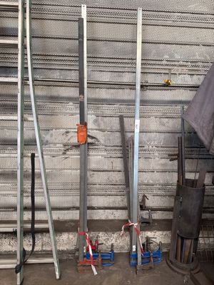 a man that is standing next to a bunch of tools