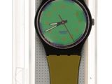 une montre verte et jaune avec un bracelet noir
