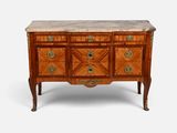 une commode ancienne avec dessus en marbre