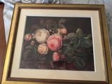 a picture of a painting of roses in a gold frame