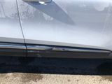 a close up of a car ' s door handle and door handle