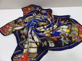 blue, red, and yellow scarf with native design on it