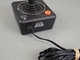 an image of a video game controller with a cord